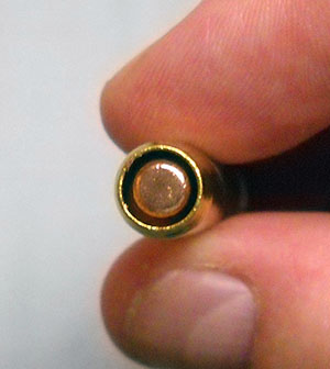 detail shot, bullet end of a 7.62mm Nagant cartridge